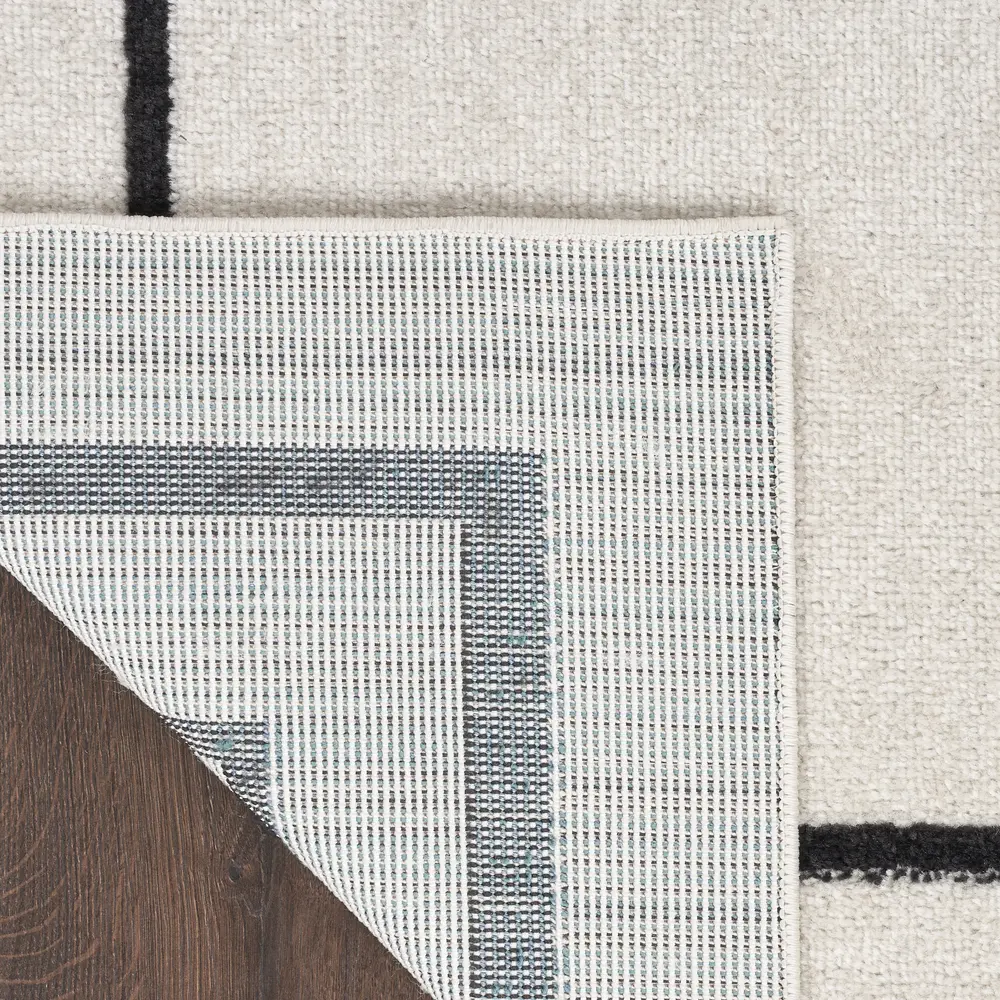 Nourison Essentials 6' x 9' Ivory/Black Contemporary Rug