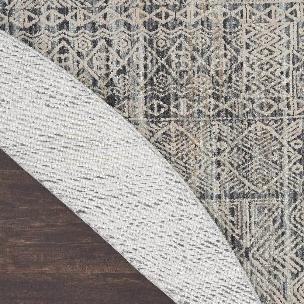 Nourison Nyle 7’10” x Round Ivory Blue Vintage Indoor Rug