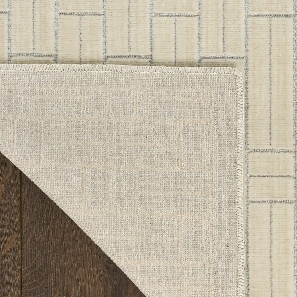 Nourison Washable Charm 4' x 6' Ivory Modern Indoor Rug